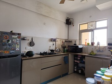 Kitchen in 2 BHK Apartment at Hiranandani Delanna, Ghodbunder Road – for Sale