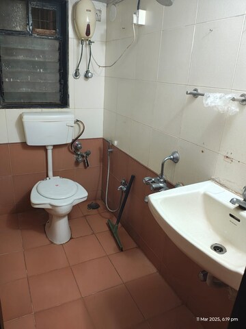 Bathroom in 2 BHK Apartment at Satellite Garden, Goregaon East – for Rent