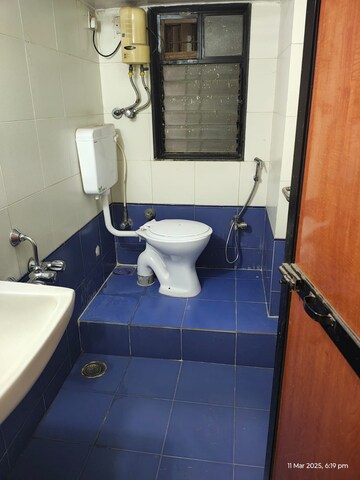 Master Bedroom in 2 BHK Apartment at Satellite Garden, Goregaon East – for Rent