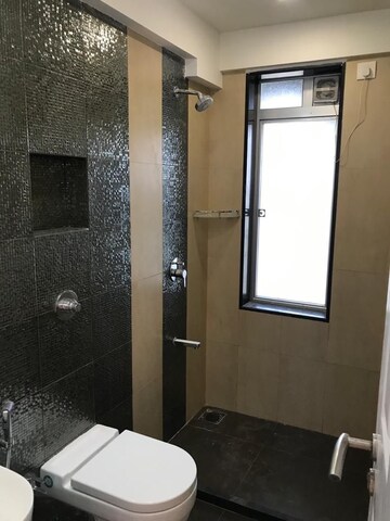 Bathroom in 2 BHK Apartment at Divine Aspen Garden, Goregaon East – for Rent
