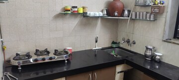 Kitchen in 1 BHK Apartment at Green Arch CHS, Kandivali West – for Rent
