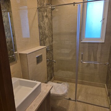 Bathroom in 2 BHK Apartment at Ambience Creacions, Sector 22 – for Rent