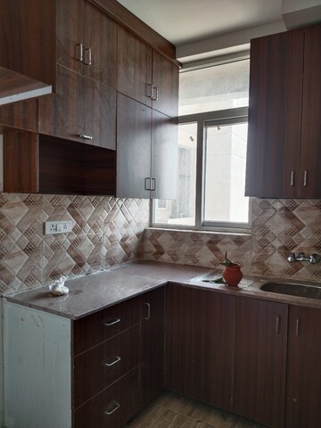 Kitchen in 2 BHK Apartment at Amrapali Riverview, Amrapali Leisure Valley – for Rent