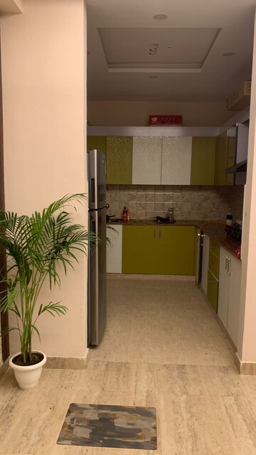 Kitchen in 3 BHK Apartment at 3C Lotus Boulevard, Sector 100 – for Sale
