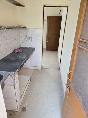Kitchen in 1 RK Apartment at Sector 16b Dwarka – for Sale