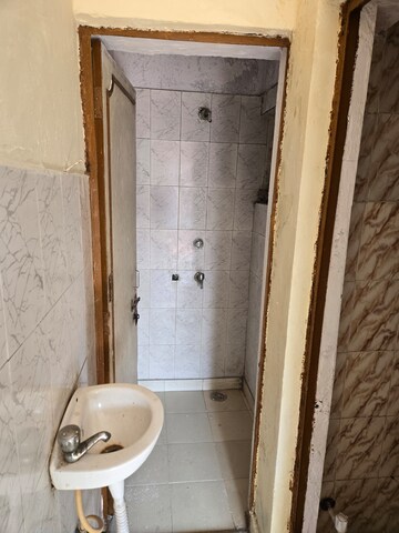 Bathroom in 1 RK Apartment at Sector 16b Dwarka – for Sale