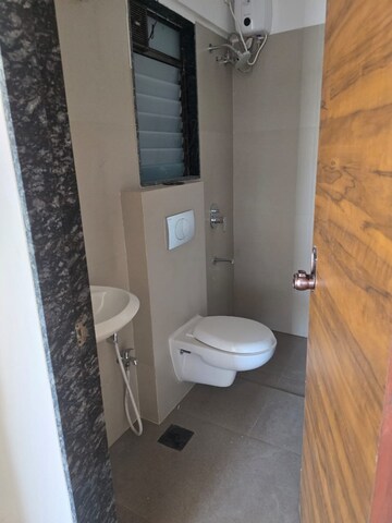 Bathroom in 3 BHK Apartment at Je And Vee Om Trimurti, Malad East – for Rent
