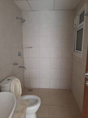 Bathroom in 2.5 BHK Apartment at Bhartiya Nikoo Homes Phase 2, Thanisandra Main Road – for Rent