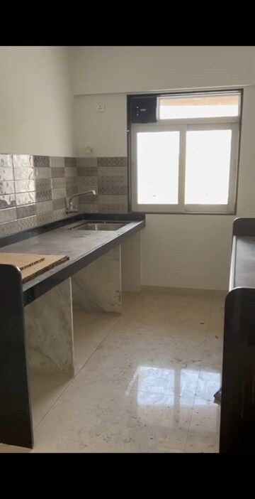 Kitchen in 2 BHK Apartment at Swastik Park – for Sale