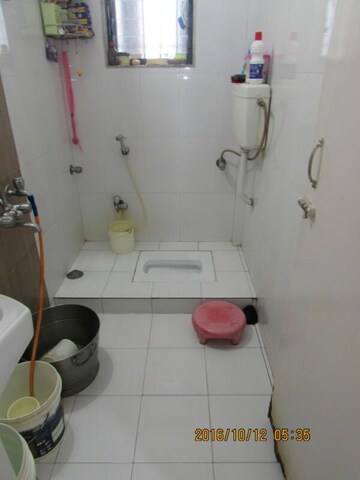 Bathroom in 2 BHK Apartment at Raunak Unnathi Greens, Kasarvadavali – for Rent