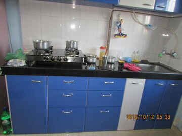 Kitchen in 2 BHK Apartment at Raunak Unnathi Greens, Kasarvadavali – for Rent
