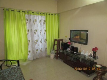 Living Room in 2 BHK Apartment at Raunak Unnathi Greens, Kasarvadavali – for Rent