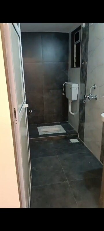 Bathroom in 1 BHK Apartment at Patel Horizon, Badlapur West – for Sale