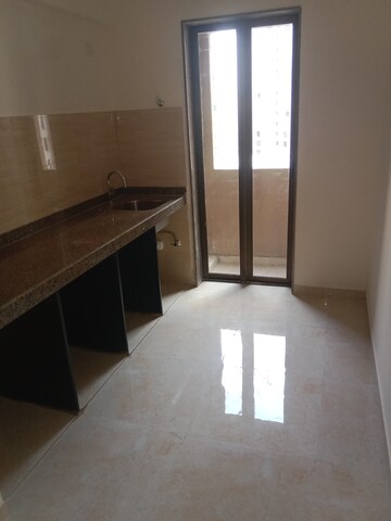 Kitchen in 2 BHK Apartment at Sunteck Maxxworld, Naigaon East – for Rent