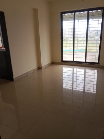 Living Room in 1 BHK Apartment at Ornate Galaxy, Naigaon East – for Rent