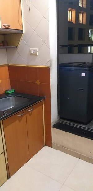Kitchen in 1 BHK Apartment at Lok Upvan Apartment Phase 2, Vasant Vihar – for Sale