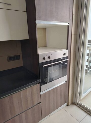 Kitchen in 3.5 BHK Builder Floor at Smart World Orchard, Sector 61 – for Rent