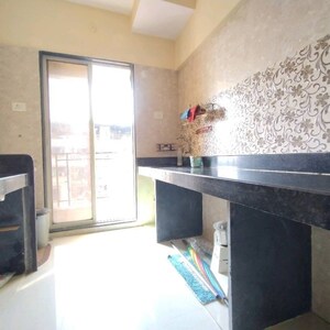 Kitchen in 2 BHK Apartment at Dharti Kailash Tower, Sector 35 – for Sale