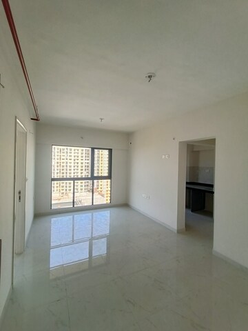 Living Room in 1.5 BHK Apartment at Runwal Gardens, Dombivli East – for Rent