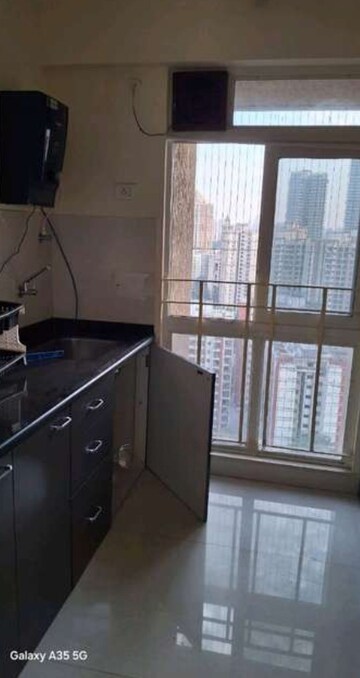 Kitchen in 1 BHK Apartment at Vijay Orovia, Ghodbunder Road – for Rent