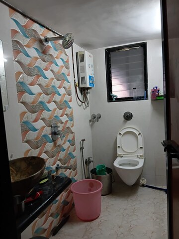 Bathroom in 2 BHK Apartment at Vile Parle East – for Rent