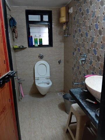 Bathroom in 2 BHK Apartment at Vile Parle East – for Rent