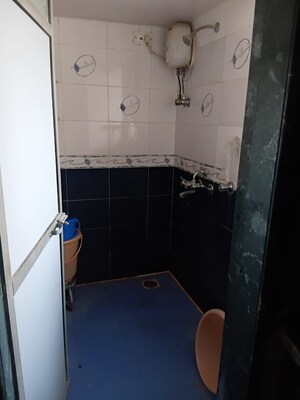 Bathroom in 1 BHK Apartment at Vile Parle East – for Sale