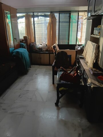 Living Room in 1 BHK Apartment at Vile Parle East – for Sale