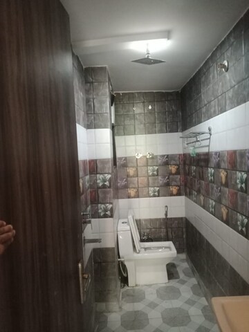 Bathroom in 3 BHK Builder Floor at Dwarka Mor – for Rent