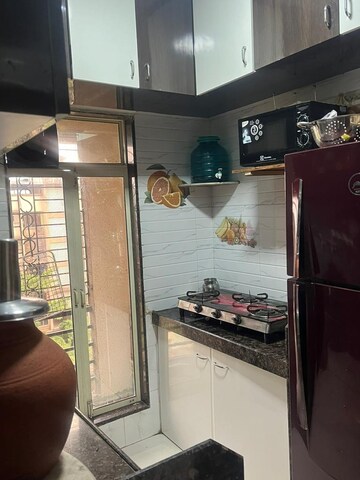 Kitchen in 2 BHK Apartment at Ruturaj Vastushilp, Nalasopara West – for Sale