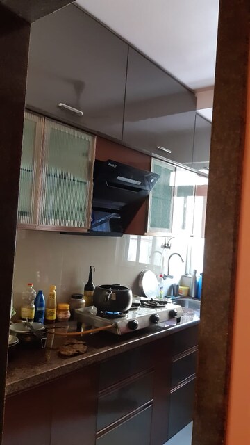 Kitchen in 1 BHK Apartment at Puranik Hometown, Ghodbunder Road – for Rent