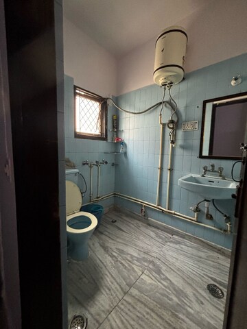 Bathroom in 2 BHK Builder Floor at Malviya Nagar – for Rent