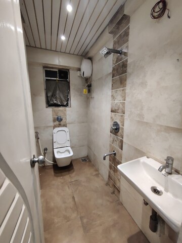 Bathroom in 1 BHK Apartment at Khar West – for Rent