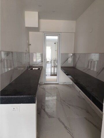 Kitchen in 3.5 BHK Builder Floor at Smart World Gems, Sector 89 – for Sale