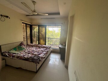 Bedroom in 2 BHK Apartment at RNV Iflex Spaces, Talavali Tarf Sonale – for Rent