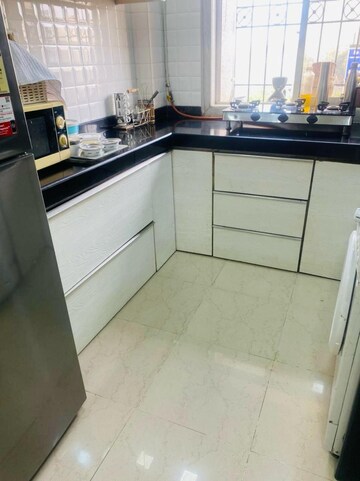 Kitchen in 3 BHK Apartment at Dhaval Sunrise Orlem, Malad West – for Sale