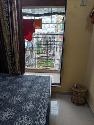Bedroom in 1 BHK Apartment at Khandeshwar – for Sale