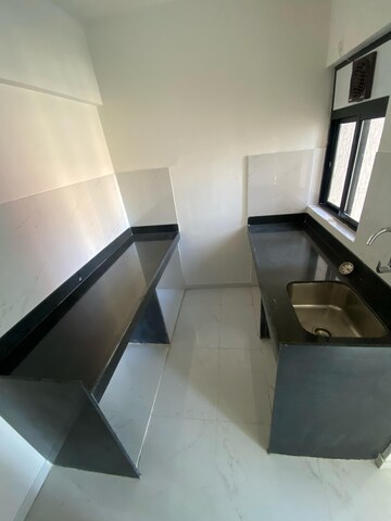 Kitchen in 1 BHK Apartment at Runwal Gardens Phase I, Dombivli East – for Rent