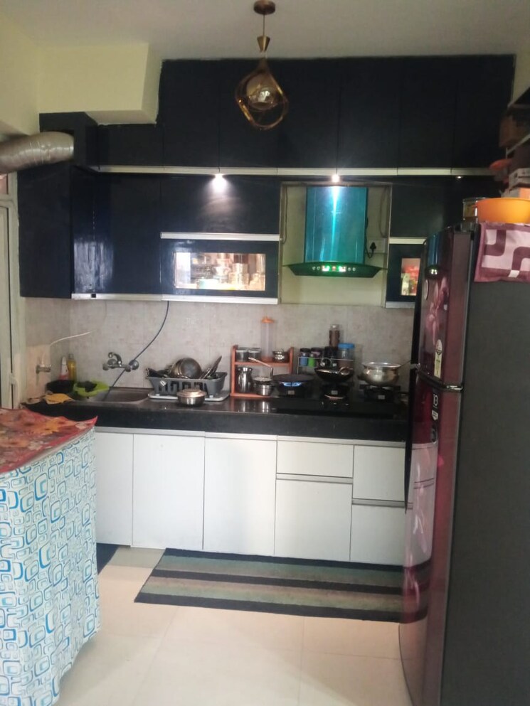 Kitchen, signature-global-the-millennia 2 Bedroom 552 Sq.Ft. Apartment In Sector 37d Gurgaon 8385442