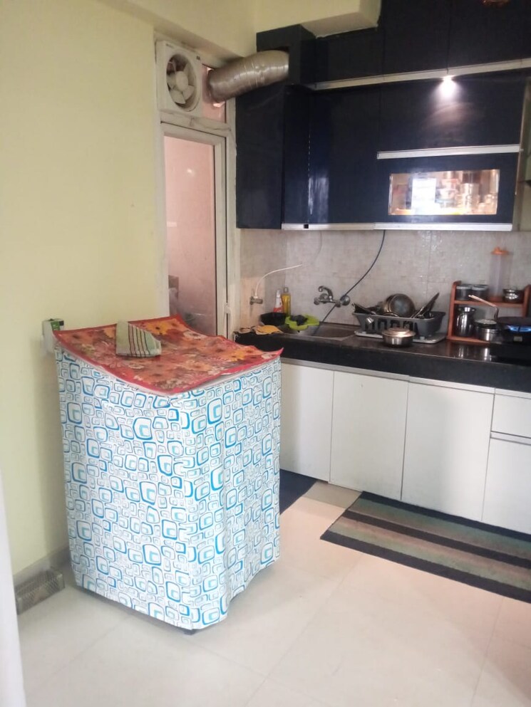 Kitchen, signature-global-the-millennia 2 Bedroom 552 Sq.Ft. Apartment In Sector 37d Gurgaon 8385442