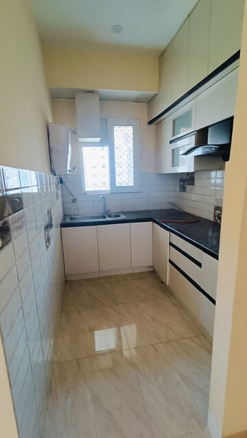 Kitchen in 2 BHK Apartment at Gaur City 7th Avenue, Sector 4, Greater Noida – for Rent