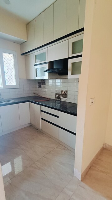 Kitchen in 2 BHK Apartment at Gaur City 7th Avenue, Sector 4, Greater Noida – for Rent