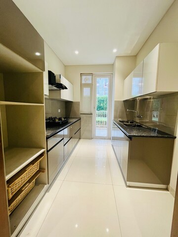 Kitchen in 3 BHK Apartment at Motia Blue Ridge, Dhakoli Village – for Sale