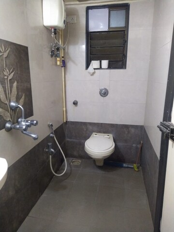 Bathroom in 2 BHK Apartment at Rohit Towers, Malad West – for Rent