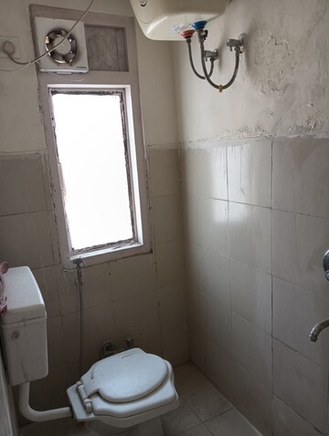 Bathroom in 1 RK Apartment at Emaar Emerald Floors Premier, Sector 65 – for Rent