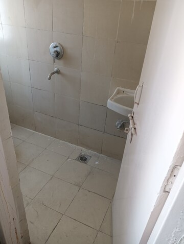 Bathroom in 1 RK Apartment at Emaar Emerald Floors Premier, Sector 65 – for Rent