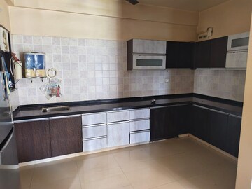 Kitchen in 3 BHK Apartment at Ajmera Casa Vyoma, Vastrapur – for Rent