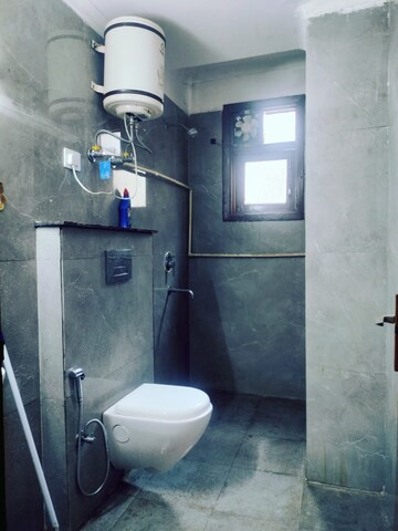 Bathroom in 1.5 BHK Builder Floor at Paryavaran Complex – for Rent