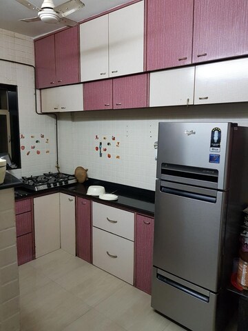 Kitchen in 2 BHK Apartment at K Raheja Palm Court, Malad West – for Rent