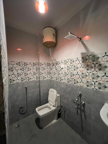 Bathroom in 1.5 BHK Builder Floor at Paryavaran Complex – for Rent